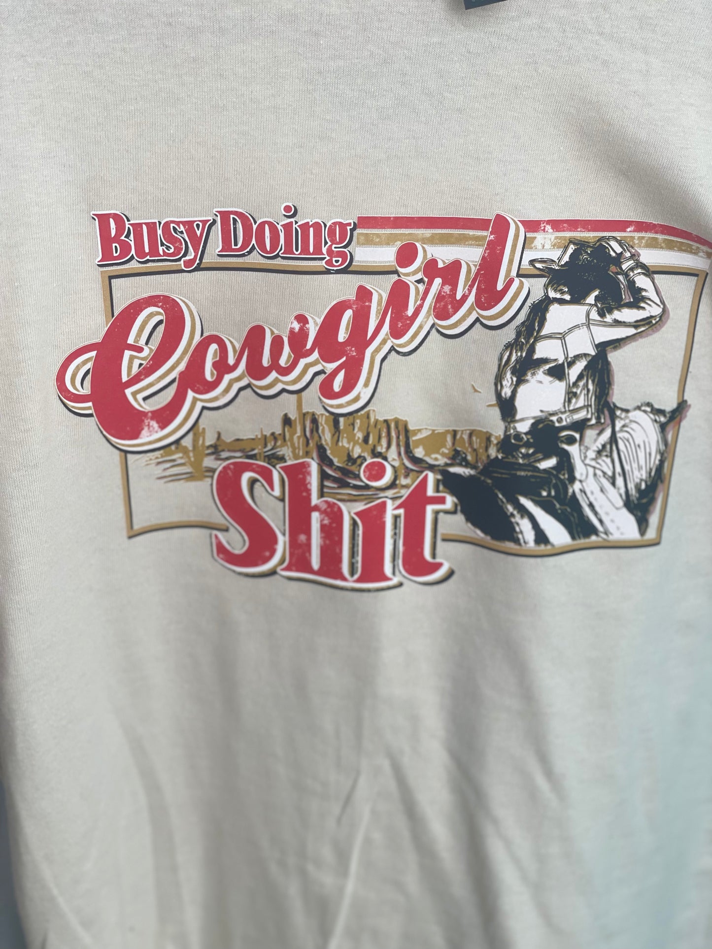 Busy Doing Cowgirl $hit Tee